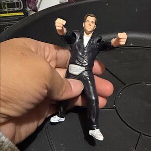 Black Action Figure with White Shoes